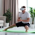 Man doing squat while wearing virtual reality glasses.