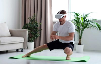 Man doing squat while wearing virtual reality glasses.