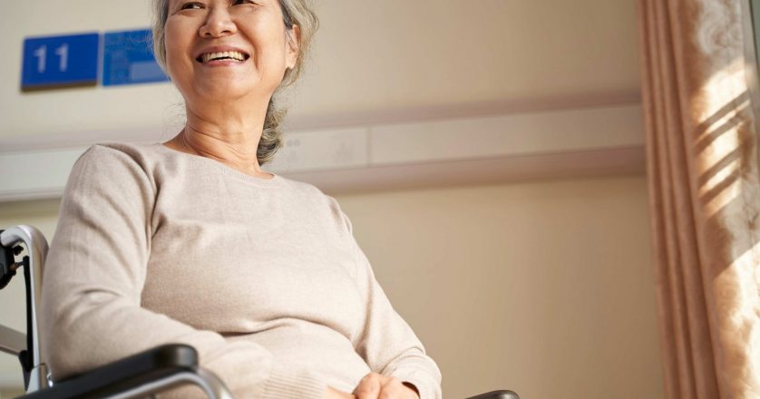 elderly woman in wheelchair at the facility