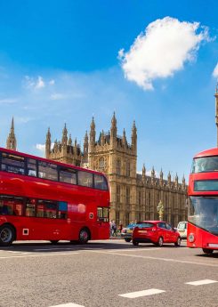 Big Ben, Westminster Bridge, red bus in London