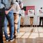 People voting at polling station.