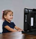 kid infront of computer screen
