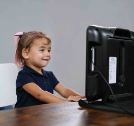 kid infront of computer screen