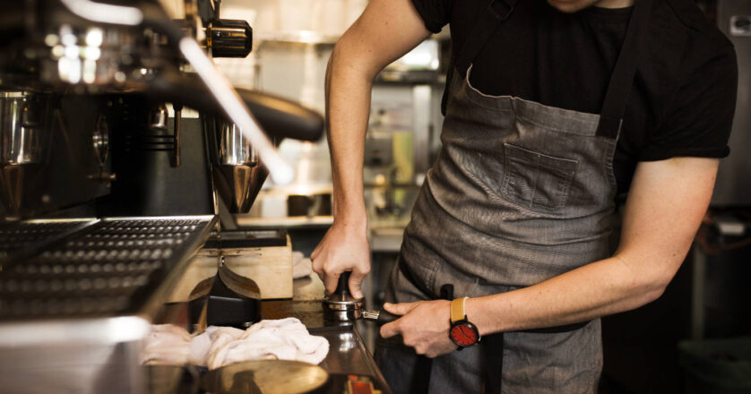 Barista working in coffee shop