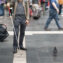 blind man with walking stick in the street