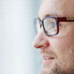 person close up wearing eye glasses
