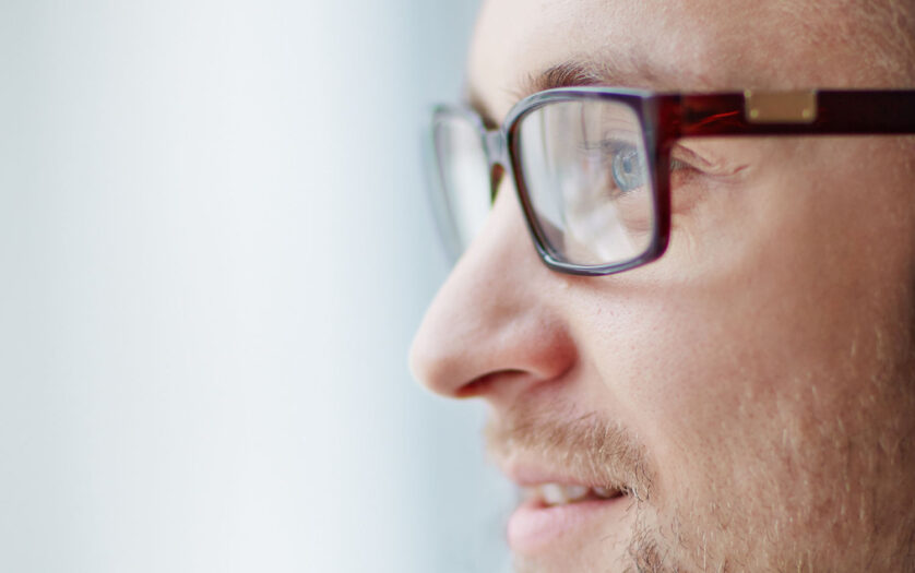person close up wearing eye glasses