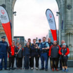 Police and athletes lighting The Flame of Hope in Christchurch
