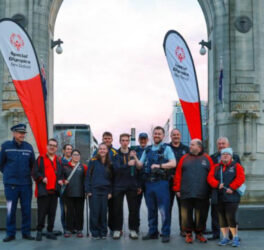 Police and athletes lighting The Flame of Hope in Christchurch