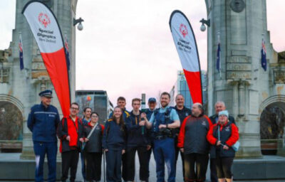 Police and athletes lighting The Flame of Hope in Christchurch