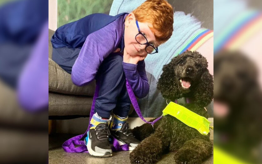 Louis Geary with his assistance dog.