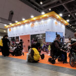 people checking products including persons with disabilities HCR exhibition 2025