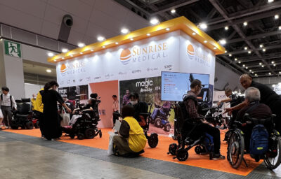 people checking products including persons with disabilities HCR exhibition 2025