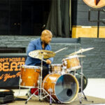 Ulysses Owens Jr playing a drum set