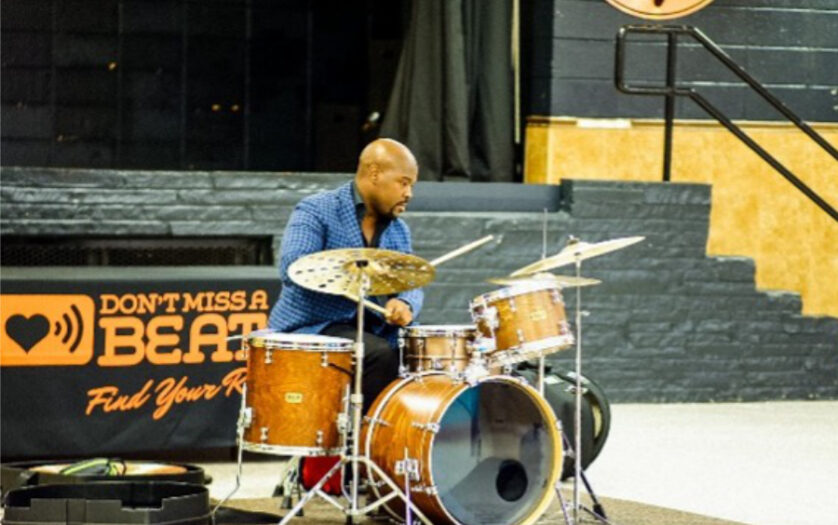 Ulysses Owens Jr playing a drum set