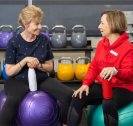 A trainer with person with intellectual disability