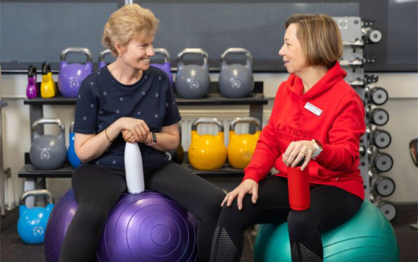 A trainer with person with intellectual disability