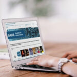 A person looking on DAHA website