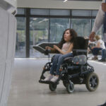 woman in wheelchair inside the building