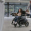woman in wheelchair inside the building