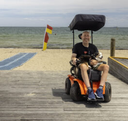 wheelchair user at beach