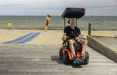 wheelchair user at beach