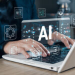 Person using computer with AI icons