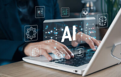 Person using computer with AI icons