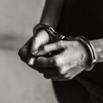Person in handcuffs