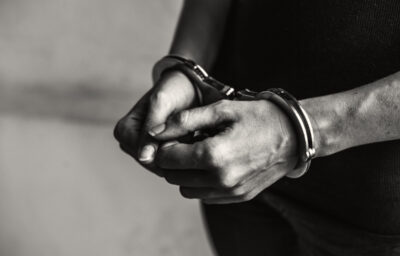 Person in handcuffs