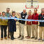 University leaders and members of the Tompkins County Chamber of Commerce celebrate the opening of New York state’s first adaptive indoor challenge course at Noyes Community Recreation Center on Feb. 10.