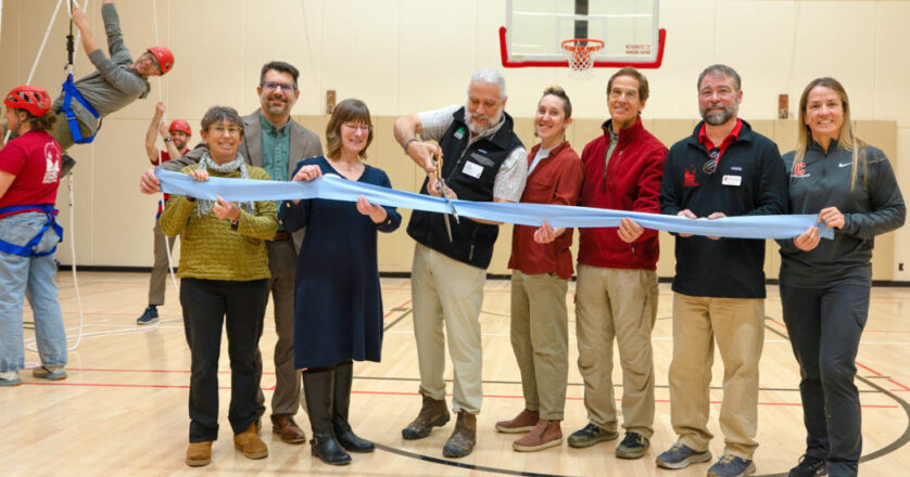 University leaders and members of the Tompkins County Chamber of Commerce celebrate the opening of New York state’s first adaptive indoor challenge course at Noyes Community Recreation Center on Feb. 10.