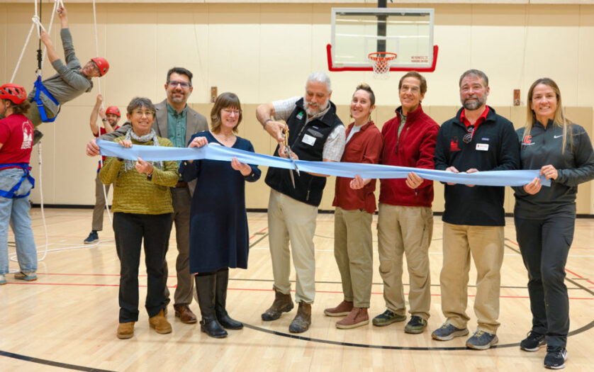 University leaders and members of the Tompkins County Chamber of Commerce celebrate the opening of New York state’s first adaptive indoor challenge course at Noyes Community Recreation Center on Feb. 10.