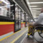 side view of a man in wheelchair at the station
