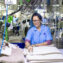 Woman Working in Textile Factory Smiling