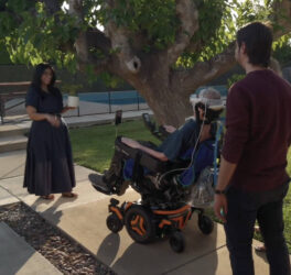 A person controlling their wheelchair using an Apple Vision Pro