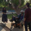 A person controlling their wheelchair using an Apple Vision Pro