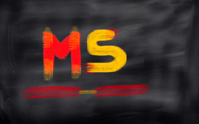 MS text against black background