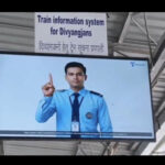 AI-powered sign language train information system at Badshahnagar railway station.