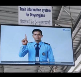 AI-powered sign language train information system at Badshahnagar railway station.
