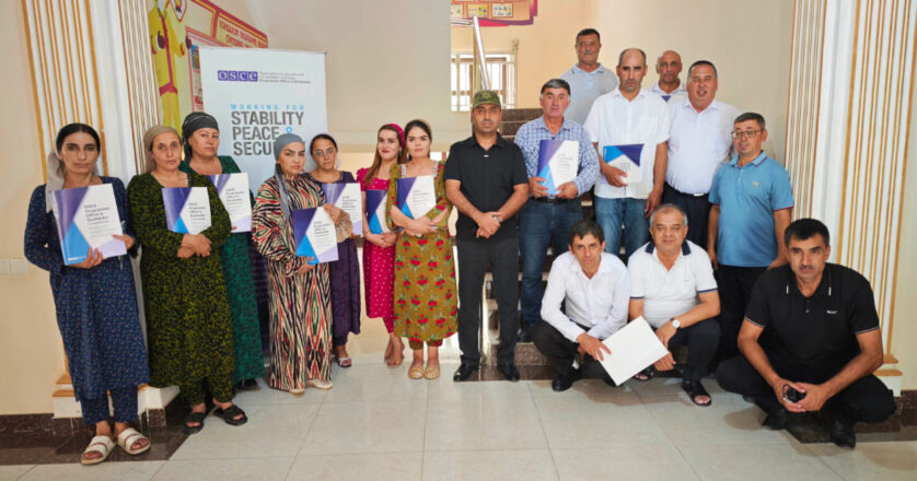 Training participants gathered for a group photo inside the Department of Education building, Darvoz, 29 July 2026