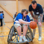 Dr Dan van den Hoek with Anastasia Mealy at a UniSC x Sporting Wheelies event