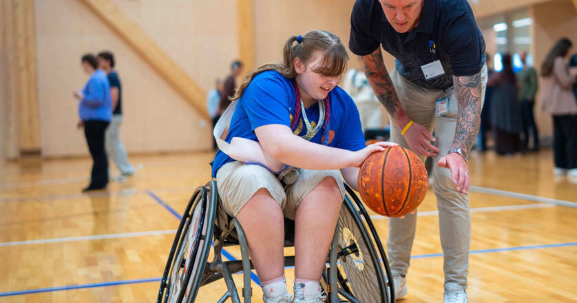 Dr Dan van den Hoek with Anastasia Mealy at a UniSC x Sporting Wheelies event