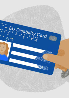Graphic - person holding EU disability-card