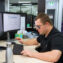 Jack Williamson working in the office