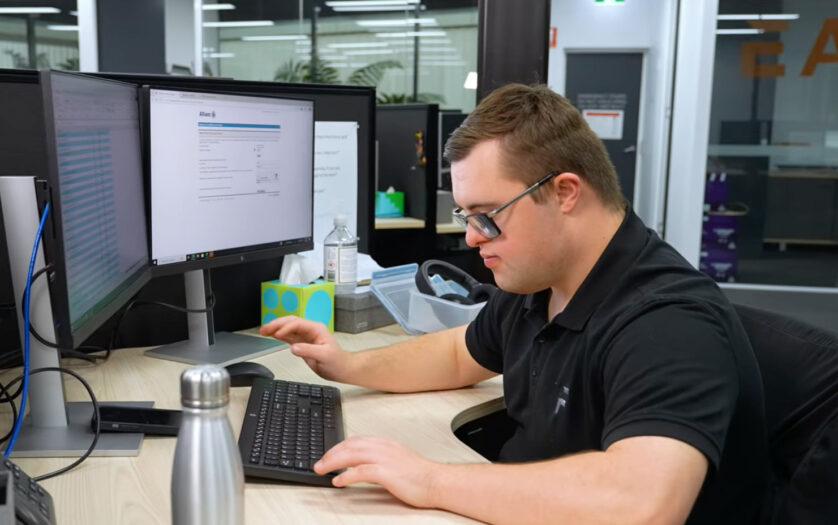 Jack Williamson working in the office