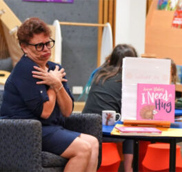 Deaf Connect Auslan interpreter at an Auslan Storytime event at Cairns Libraries