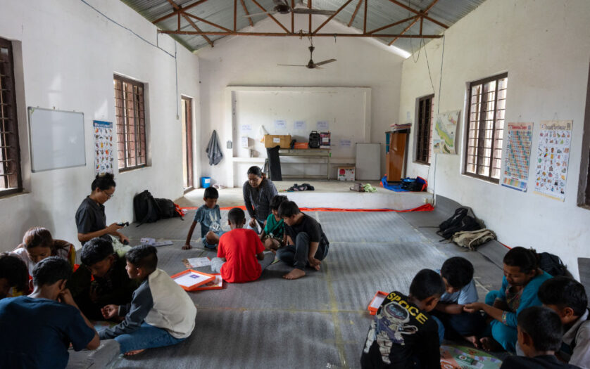 children sitting on the floor of safe spaces in Bidur 8, Nepal