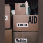 Close-up of aid packages with labels for food and medicine