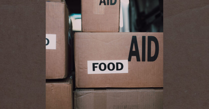 Close-up of aid packages with labels for food and medicine